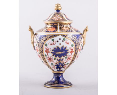 A Royal Crown Derby bone china amphora shaped vase with cover, 1902, Old Imari pattern No. 1128, 14cm, an urn shape covered v