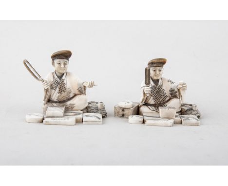 Two Japanese carved ivory Okimonos, probably Meiji, modelled as seated craftsman, one with a saw, the other with a chisel, so