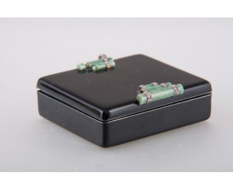 Cartier - a black enamel on silver compact, the cover having three jadeite bars to top and bottom with diamond set barrel ret