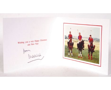 HRH The Prince of Wales - Prince Charles signed Christmas card. With gilt embossed Prince of Wales cipher to cover and colour