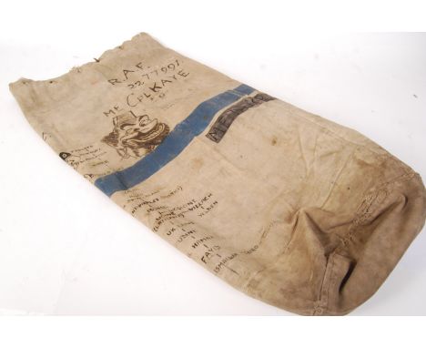 An original WWII Second World War military issue canvas bag. The bag belonging to a R.A.F Royal Air Force 2277991 Corporal Ka