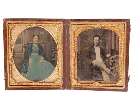 A rare 19th century c1860 believed American Civil War era double sixth plate tinted ambrotype photograph pair. Depicting a ge