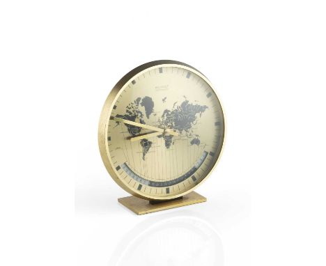 A Kienzle Chronoquartz 'world time' clock, the gilt dial with map of the world, and 24 hour scale below, 18.5cm wide.