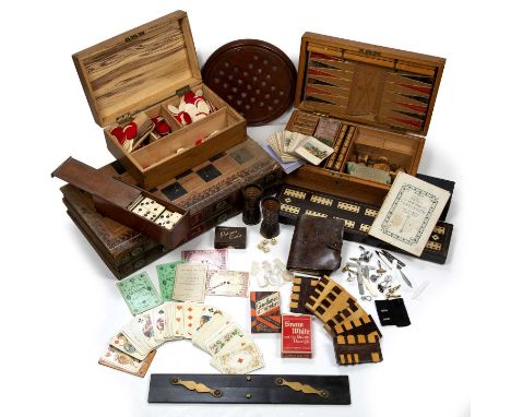 A late Victorian games compendium, containing cribbage board, cards, small die-cast horse racing figures etc, in pine box, si