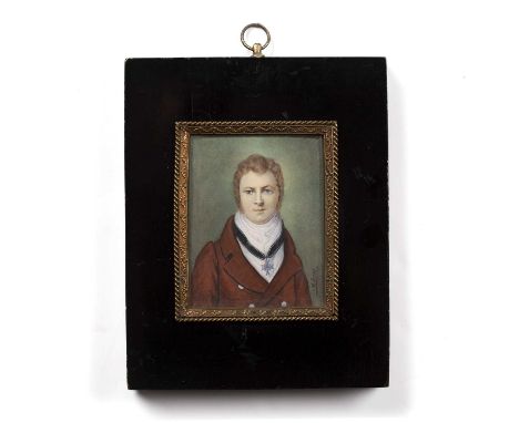 English school (late 19th century)A rectangular miniature portrait of a young man, in red topcoat and wearing a blue enamel o