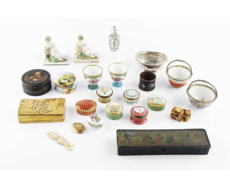 A 19th century carved mother o'pearl needle case, in the form of a stepping figure, 8cm high, two early 19th century pearlwar