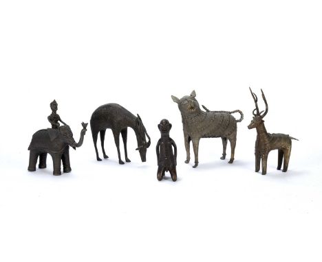A group of five cast metal sculptures of the Dhokra Damar, West Bengal, including a man kneeling, an antelope and a man ridin
