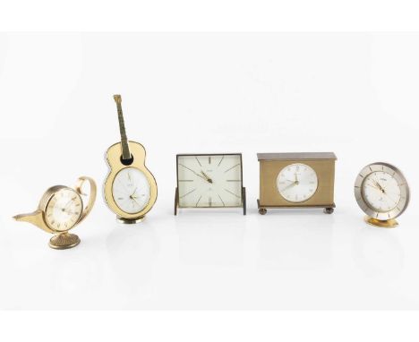 A West German Mauthe travel alarm clock, with circular dial, in gilt rectangular case, 10.5cm wide, a Roamer circular travel 