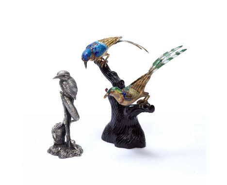 Two Oriental enamel birds, resting on a tree branch made from resin, 17cm high, with a standing white metal model of a king f