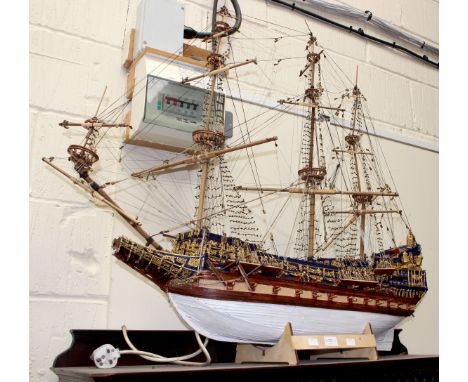 A large handmade model of 'The Sovereign of the Seas', made to scale, with guns, rigs, with various gold leaf decoration, com