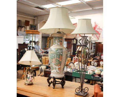 A large Oriental and floor standing standard lamp with a large baluster shape vase base, hand painted, together with a figura