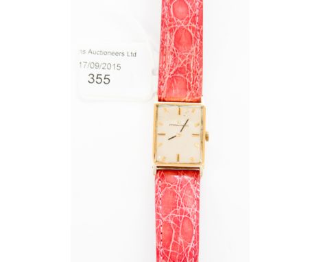 An 18ct gold Eterna Matic wristwatch, mid-size, on crocodile strap 
