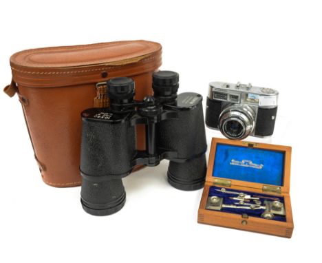 A Vitomatic 1970's camera with instruction manual and extra lenses, complete with box, a Zenith pair of binoculars with lens 