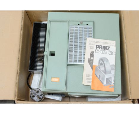 A Prinz view slide projector, a Prinz auto, a good collection of slides. (Three boxes)