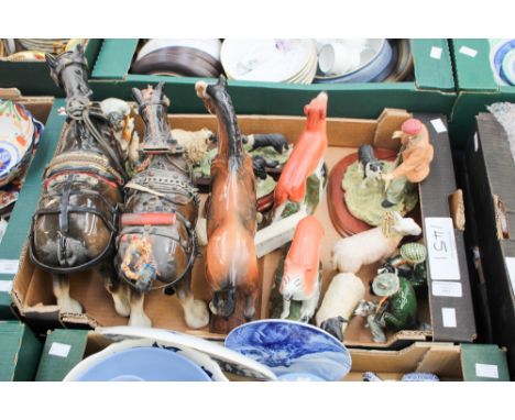 A box of ceramic figures of horses, sheep, etc.
