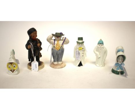 A Royal Doulton 'Stylish Snowman' from 'The Snowman Gift Collection', together with four various Royal Worcester figural cand