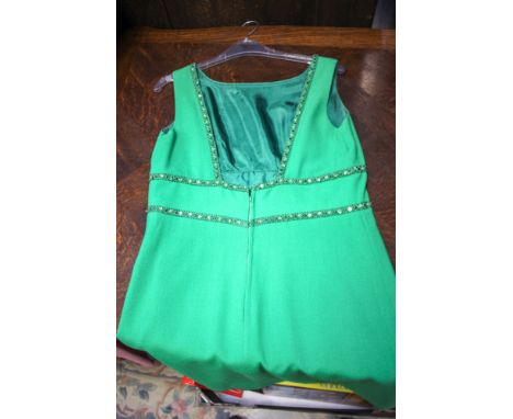 A jade green cocktail dress in wool crepe  by Peter Baron decorated with sequins and braiding, sugar pink shirt dress with ro