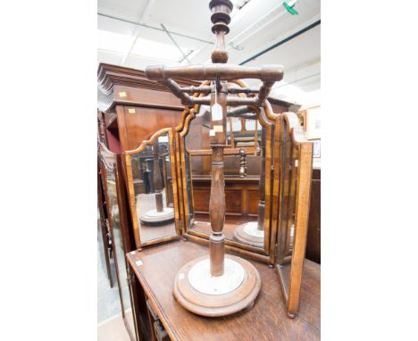 An early 20th Century triple dressing table mirror, together with a 19th Century stick stand.
