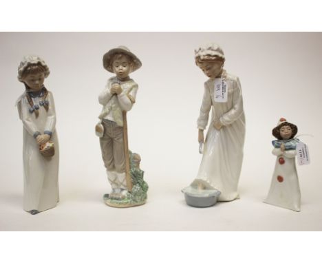 Four Nao figures, one of a boy with a dove and a girl with a basket of flowers and others.