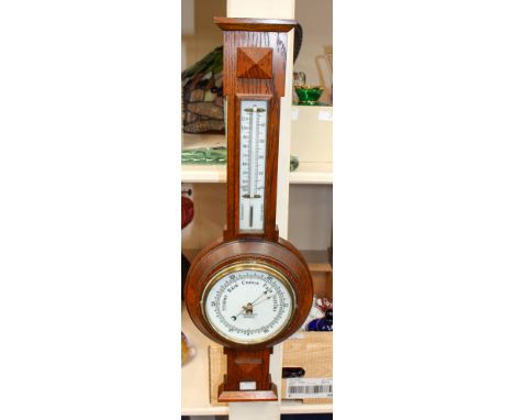 A 1940's mantel clock with a Frank J Gould barometer. (2)