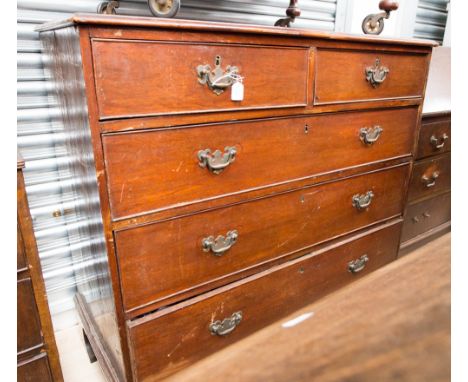 A George III mahogany chest of drawers, fitted with two short over three long graduated drawers, raised on bracket feet