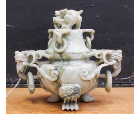 A carved Jade Sense pot and cover.