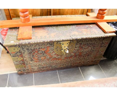 A 19th Century brass studded and brass bound trunk.
