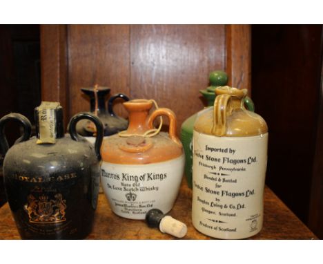 Ceramic whisky decanters, unopened, including Munros, King of Kings, Grants Deluxe, Usquaebach, Royal Cask and Chequers. (5)