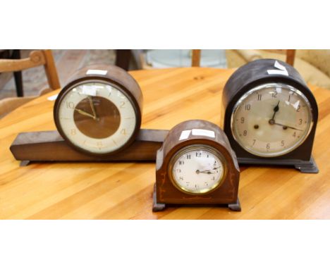 An early 20th Century mantle timepiece in the Art Nouveau style, mahogany inlaid with boxwood and ebony, French movement; tog