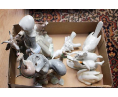 Two Lladro figures and four others. (6)