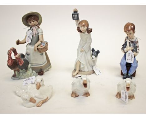 Collection of six ceramic figures, including Lladro and Nao.