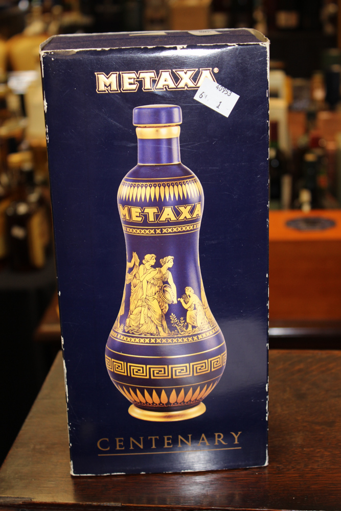 Metaxa Centenary brandy, in gilded blue ceramic bottle