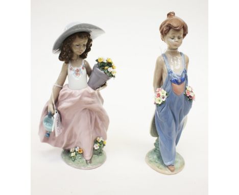 Two boxed Lladro figures of a girl and a boy.