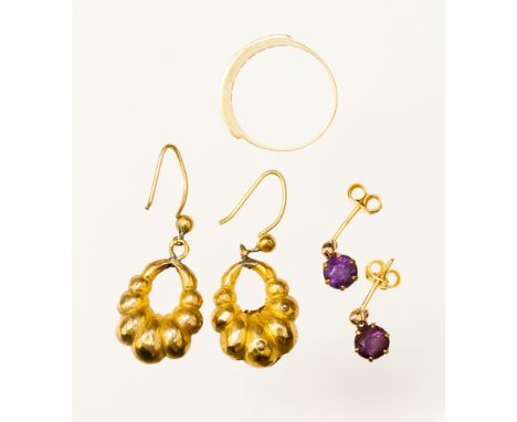 A 9ct gold garnet set half eternity ring, a pair of 9ct gold amethyst single stone drop earrings and a pair of 9ct gold hollo