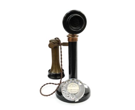 A candlestick telephone with ear piece and dial (No bell box) 