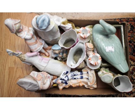 A collection of Continental bisque ceramic figures.