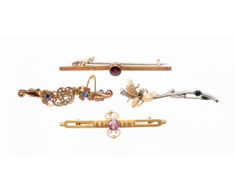 A 15ct gold bar brooch with central amethyst with seed pearls - three each side, a rose metal bar brooch with central garnet,