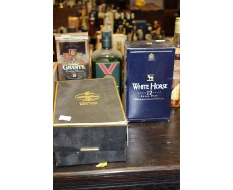 White Horse 12 year old, William Grants 15 year old, Ambassador Royal 12 year old and QE2 Bowmore in ceramic flagon. (4)