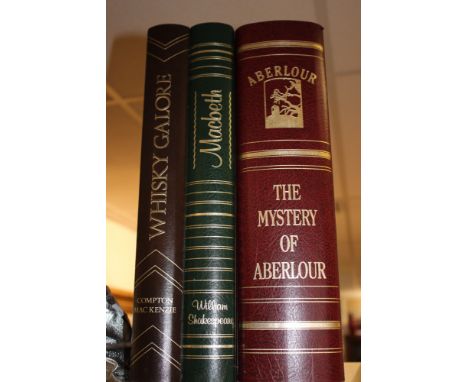 An Aberlour whisky stationary box in the form of three leather bound books and fitted with a bottle of Aberlour 10 years old 