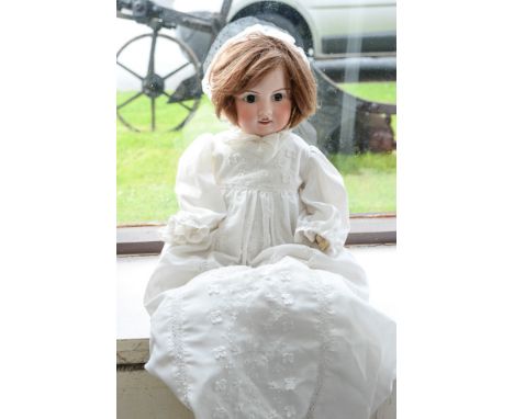 A circa 1914 ceramic head doll, imprint to back of the head 'ELAINE', 10 inch, one finger damaged, reproduction period clothe