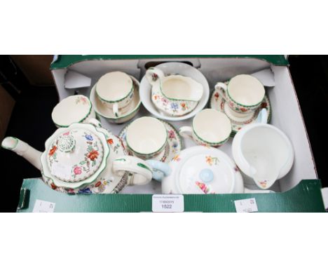 A three piece Shelley tea set, comprising tea pot, sugar bowl and milk jug, together with a Copeland Spode Chinese rose patte