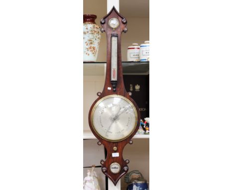 A 19th Century rosewood veneered banjo barometer and thermometer, by John Pensa & Son, circa 1840 in the Gothic manner with s