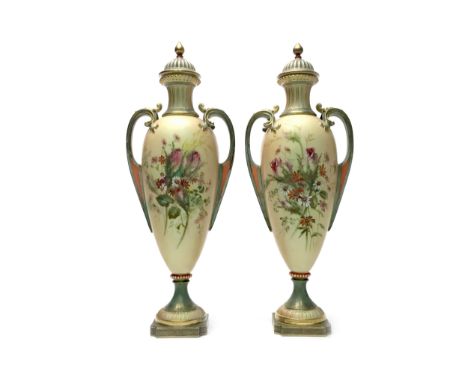 PAIR OF ROYAL WORCESTER VASES WITH COVERS, painted with flowers, printed marks in green, shape number 1957, 36.5cm high