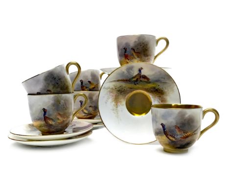 ROYAL WORCESTER COFFEE SERVICE, painted with pheasants in landscape, by James Stinton, signed, painted marks in puce, the cup