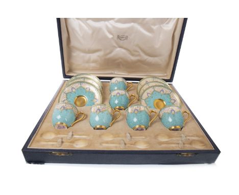 ROYAL WORCESTER COFFEE SERVICE, painted with stylised foliate designs in coloured enamels and gilt, comprising six cups and s