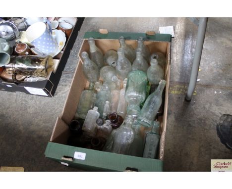A box of vintage glass bottles