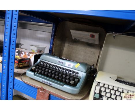 An Imperial typewriter in carry case