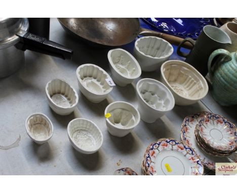 A quantity of vintage jelly moulds