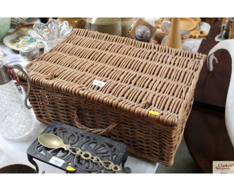 A wicker picnic hamper and contents of a leather satchel