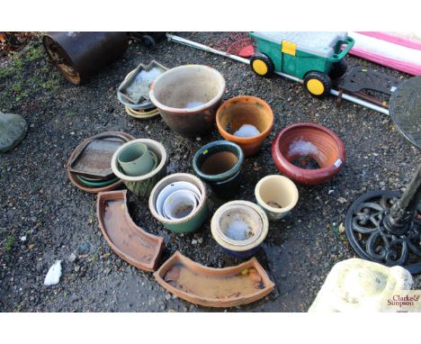 A quantity of ceramic garden planters and trays etc.